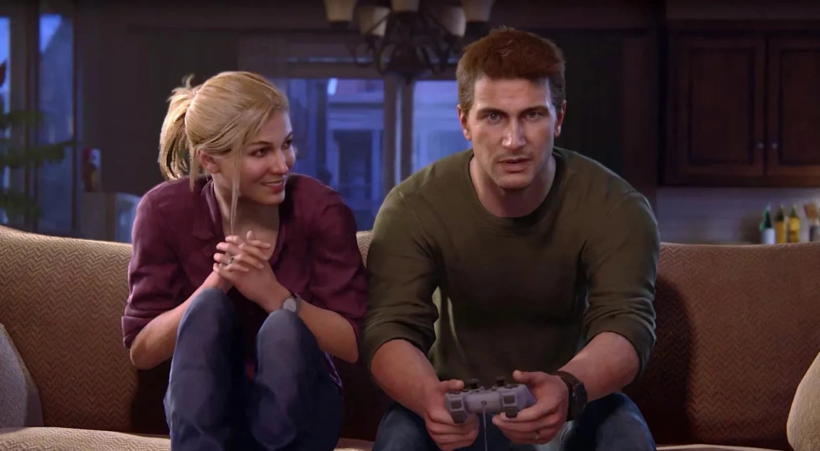 Nathan Drake, main character of Uncharted game series, playing couch co-op with his in-game wife Elena